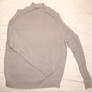 Heather gray cold shoulder/ turtle neck sweater.